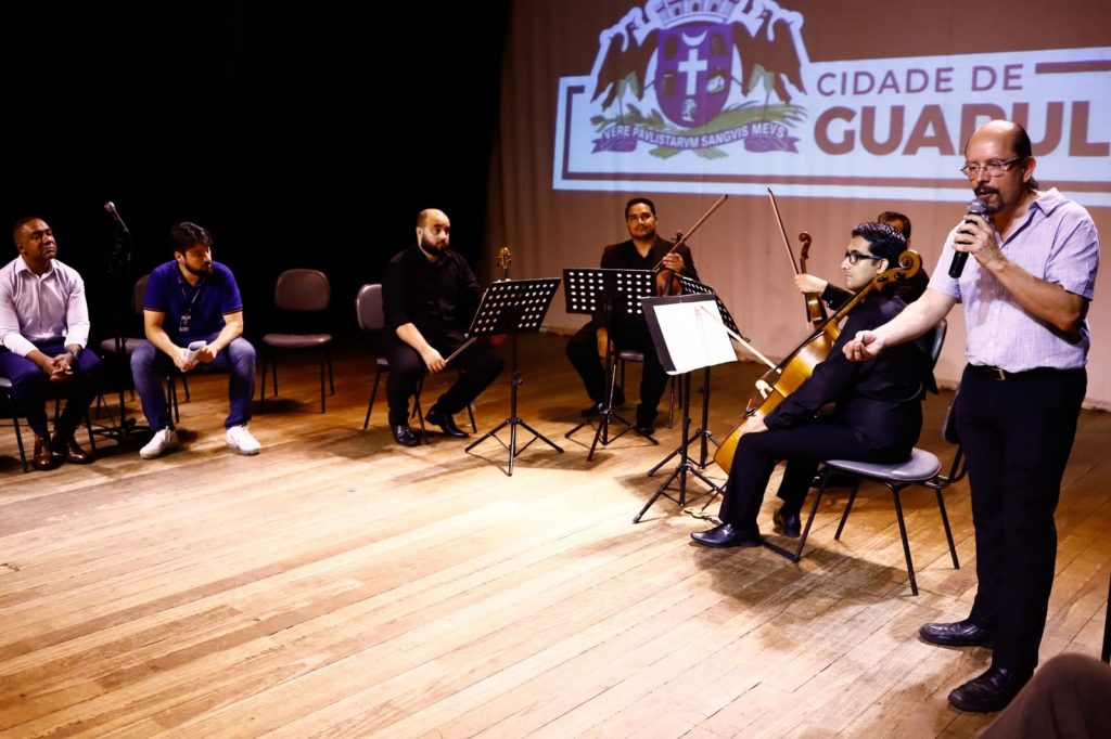 Professor Jesus, Guti e Patarra no lançamento da programação das orquestras