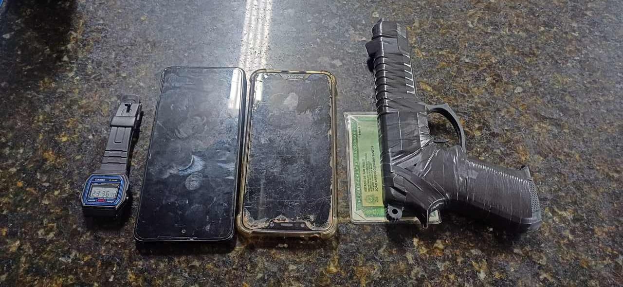 Celulares e arma